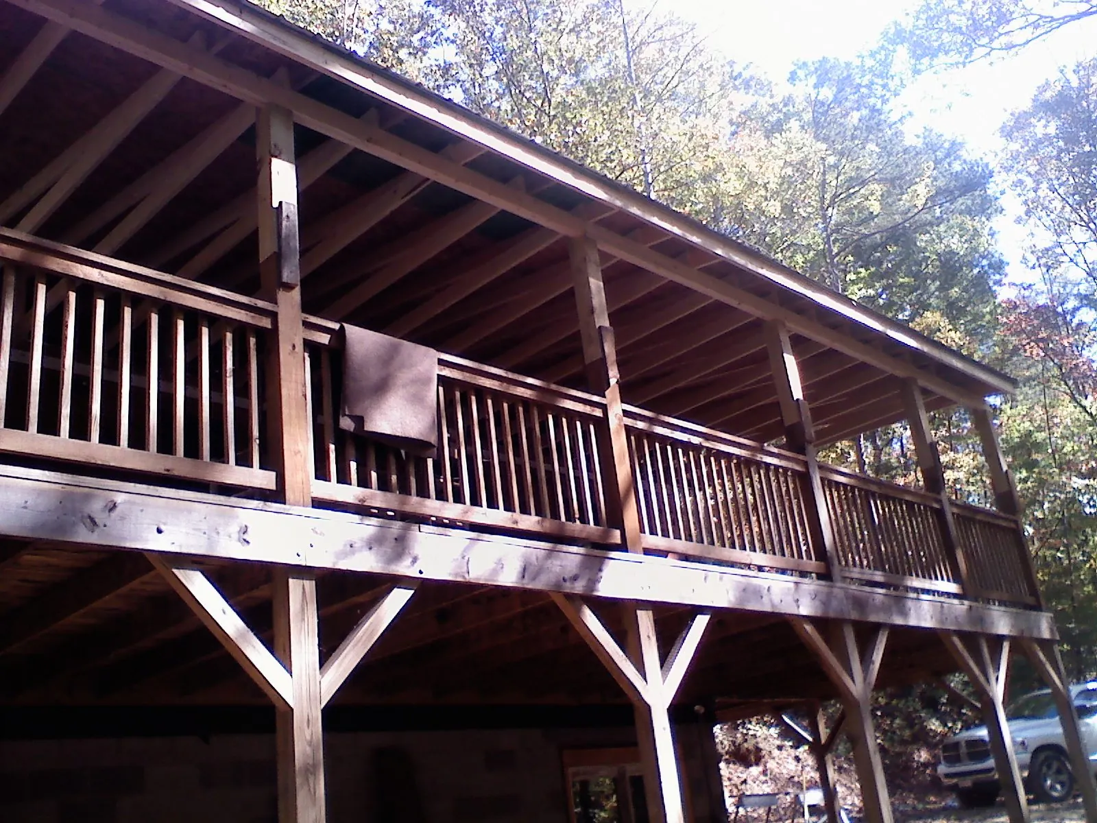Timber framing under a new elevated porch and deck — Roof Leak Repair in Oriskany by Roofing Brothers